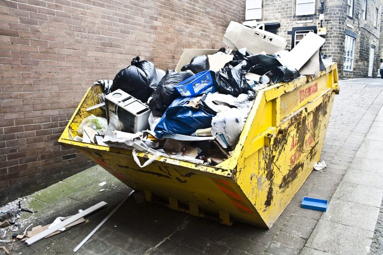 Is it an Offence to put rubbish in someone elses skip UK
