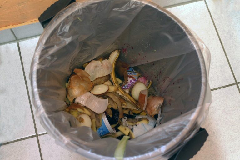 Is it illegal to put household waste in a public bin UK